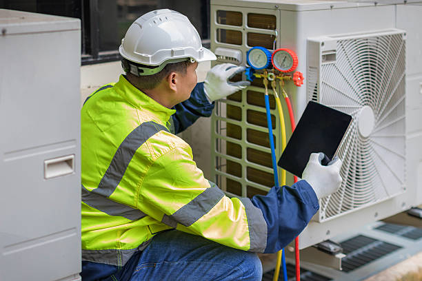 Professional Air Conditioning Repair technician working in Westborough, MA